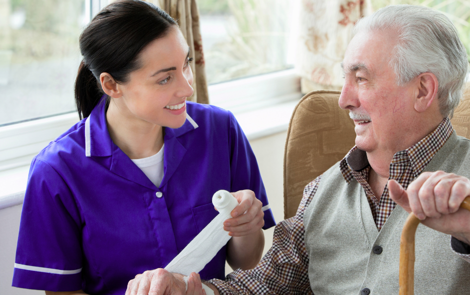 carer smiling with a service user
