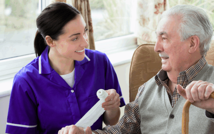 carer smiling with a service user