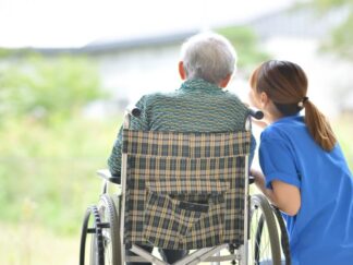 Picture of carer and elderly service user