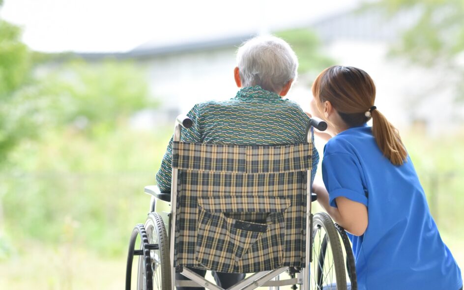 Picture of carer and elderly service user