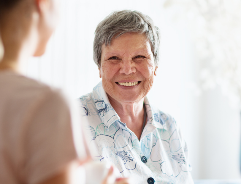 service user receiving home care in oxford smiling