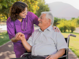 all care home care care assistant helping service user in a park