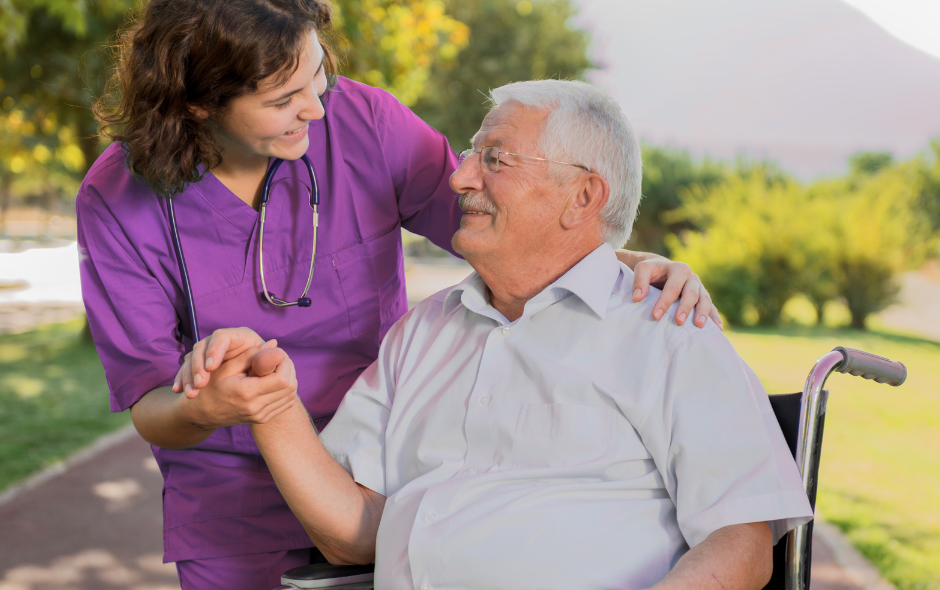 all care home care care assistant helping service user in a park